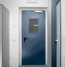 Синяя огнеупорная дверь со стеклом в лечебном учреждении 